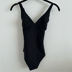 SKIMS Body Core Sculpt Unlined Plunge Thong Bodysuit in Onyx size XS